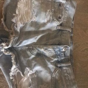 american eagle ripped multiple button shorts